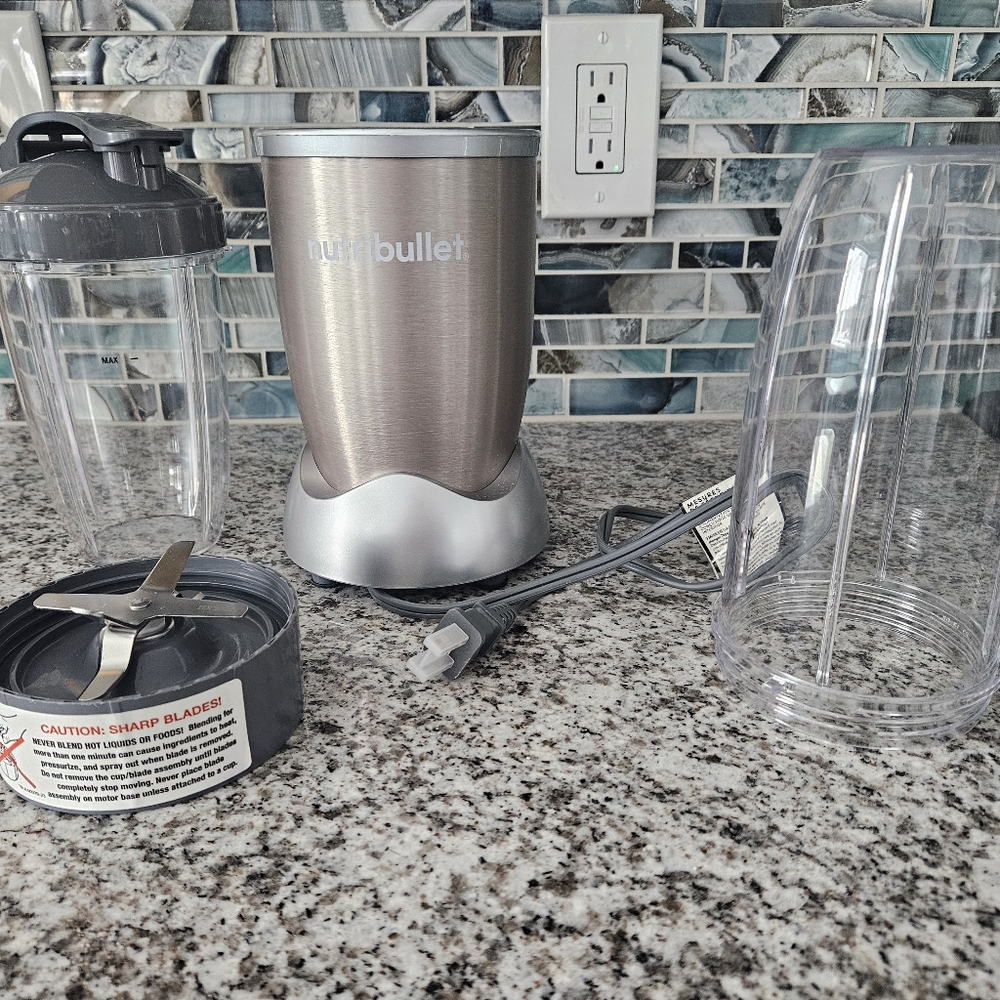 Nutribullet Pro® Blender, Classic Metallic champagne Color. W/ 2 Blender Cups